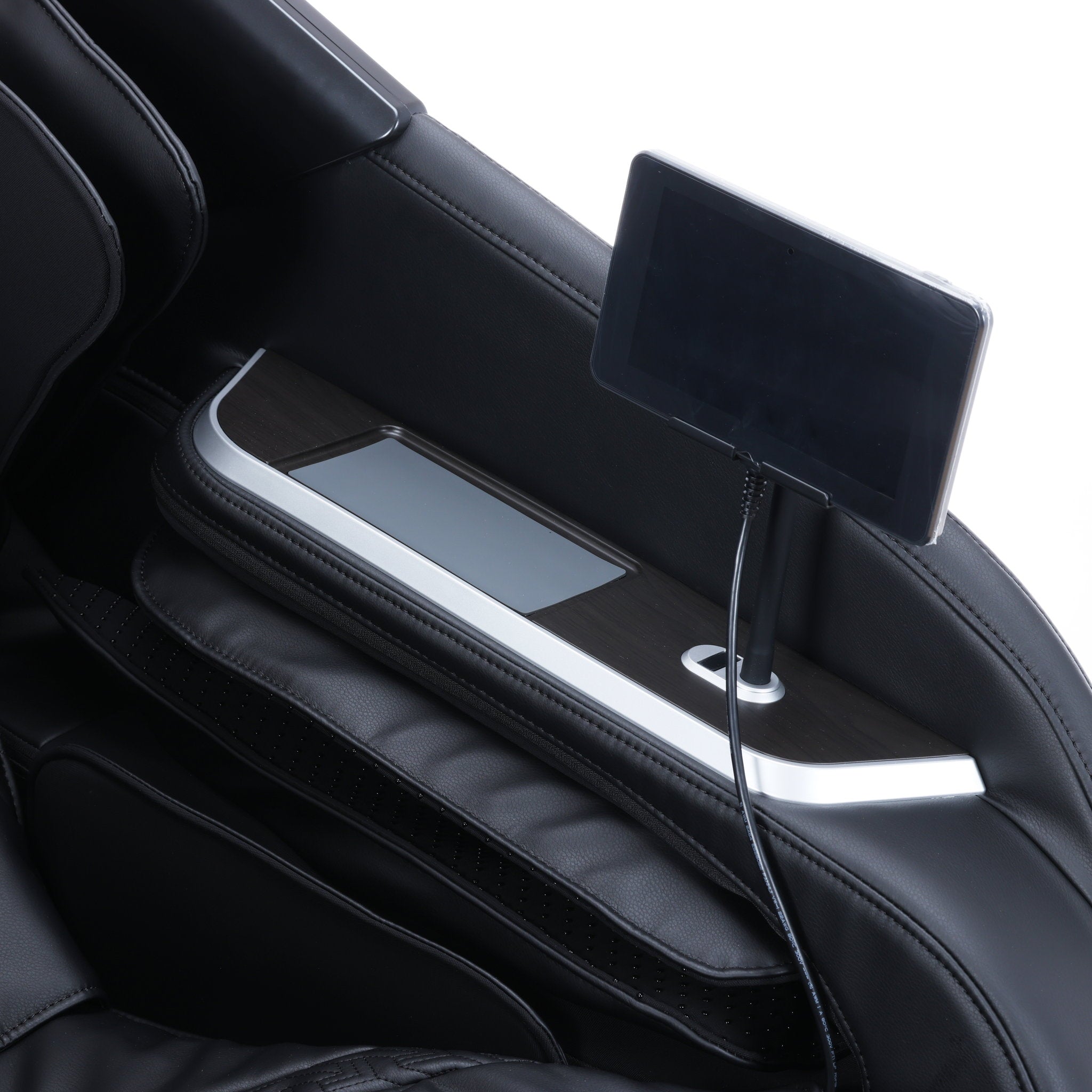 Osaki One Pro 4D massage chair in black — close-up of the tablet remote control